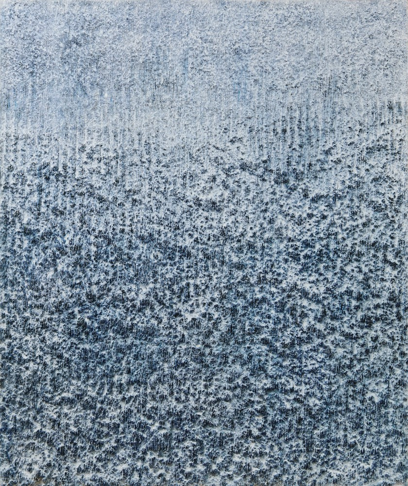 A pale blue and grey painting by Lee Jinwoo, the surface dense with crushed charcoal showing through torn hanji, lighter at the top and darkening toward the bottom.