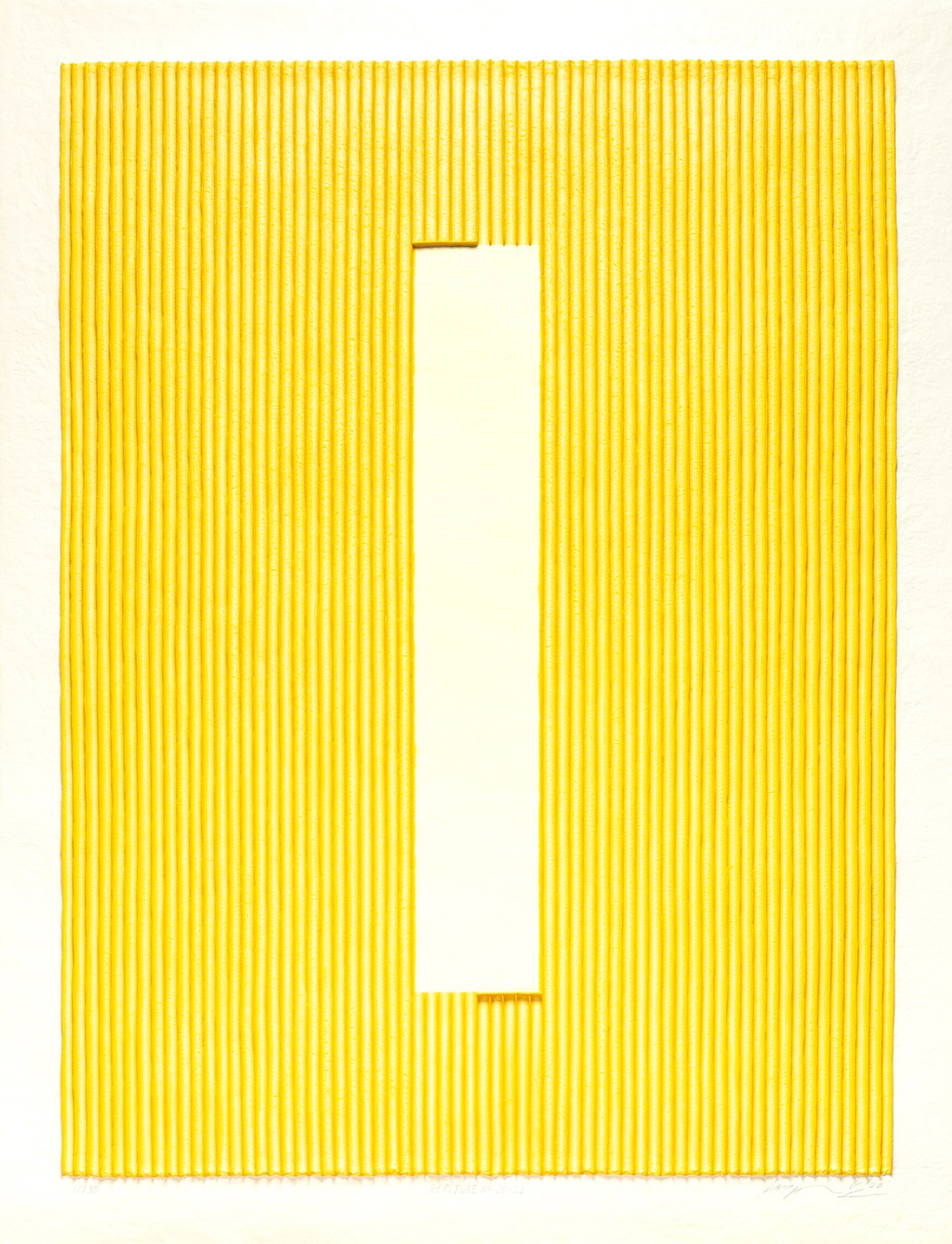 A vertical sheet of fine yellow paper ridges running top to bottom, interrupted by a smooth pale rectangle, with pencil marks in the white margin.